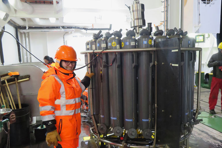 Preparing the water from the CTD rosette for filtering onboard the ship Preparing the water from the CTD rosette for filtering onboard the ship