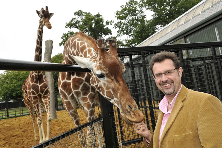 David Field from ZSEA with the giraffes David Field from ZSEA with the giraffes