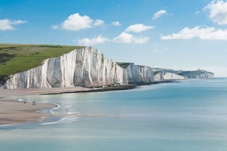 The White cliffs of Dover, Kent, UK are formed from layers of limestone chalk The White cliffs of Dover, Kent, UK are formed from layers of limestone chalk