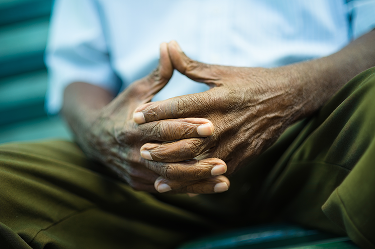 Image: An elderly man's hands clasped together showing wrinkles in the skin. Image: An elderly man's hands clasped together showing wrinkles in the skin.