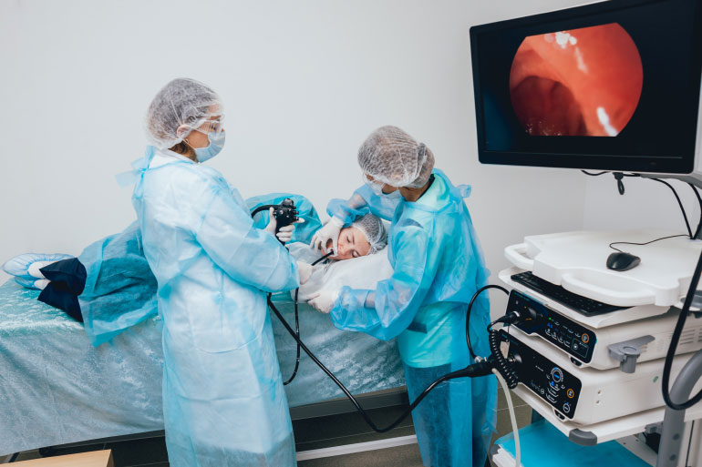 Patient undergoing endoscopy procedure to assess prognosis of IBD Patient undergoing endoscopy procedure to assess prognosis of IBD