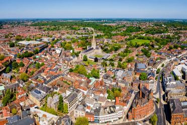 Aerial view of Norwich Cathedral located in Norwich, Norfolk, UK