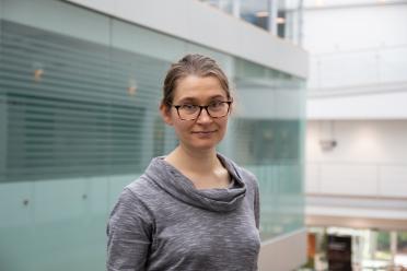 New Group Leader, Dr Edyta Wojtowicz, pictured in the atrium of the Earlham Institute