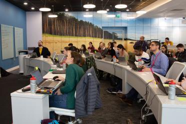 Participants on our Data Carpentry workshop in the training suite at the Earlham Institute