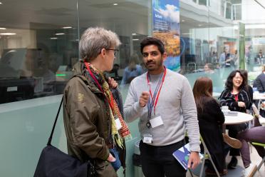 Delegates at the single-cell symposium networking during the coffee break