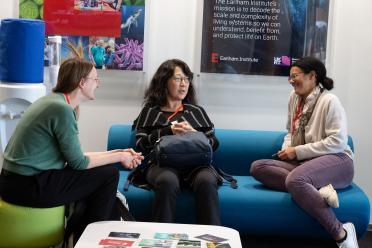 Dr Seung Yon (Sue) Rhee, keynote speaker, sitting and talking with Dr Nicola Patron on the right, and Dr Leonie Luginbuehl on the left
