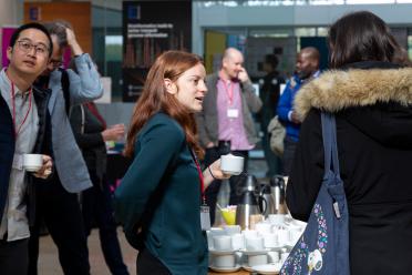Delegates at the single-cell symposium networking during the coffee break