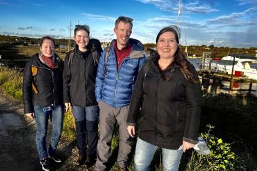 Year in Industry student Santa Walker with members of her lab group on a field trip to collect sea beet samples