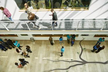 Looking down from above into the atrium of the Earlham Institute building