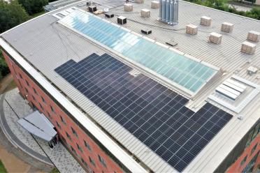 Solar panels being installed on the roof of the Earlham Institute.