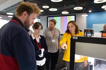 Lesley Ives from the Earlham Biofoundry demonstrating how to use the Opentrons robot at a recent training event