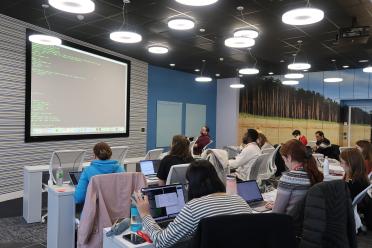 Participants on our Data Carpentry workshop in the training suite at the Earlham Institute
