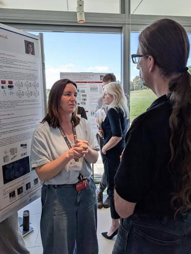 Ashleigh Lister discusses her work in spatial biology during the industry poster showcase