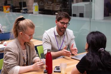 Delegates networking during the conference break