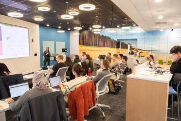 Participants on an EI training course sitting in the Darwin Training Suite