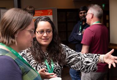 Delegates at the BioFAIR conference networking