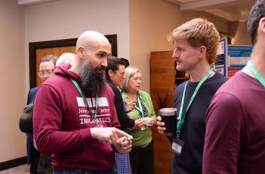 Delegates at the BioFAIR conference networking
