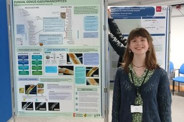 Poppy presenting a research poster at the CMI conference