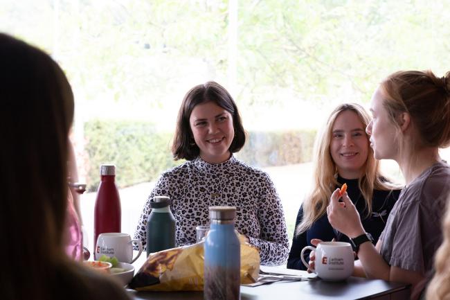 PhD Students Mia, Daria and Lucy having lunch together. 