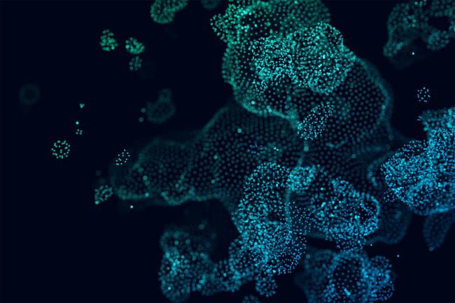 Abstract dots clustered together on dark background